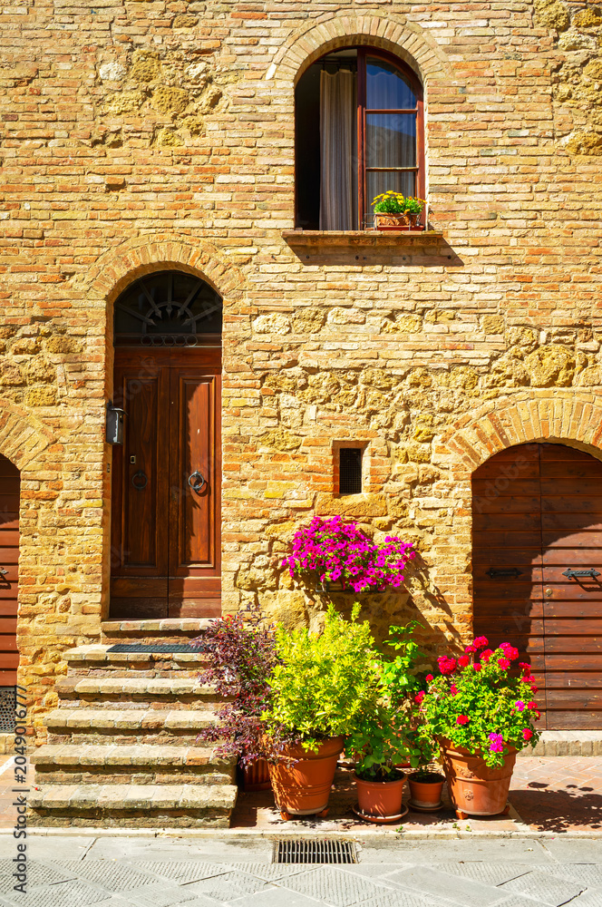 Naklejka premium View of the ancient palaces in Pienza, medieval village of Tuscany (Province of Siena, Italy); is world famous for its renaissance monuments.