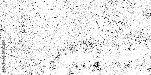 Foto A gritty, abstract texture of black and white speckles on a textured surface, evoking a sense of urban decay or distressed material