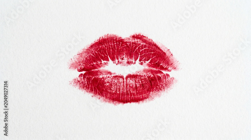 Red Lipstick Kiss Mark on White Paper Background