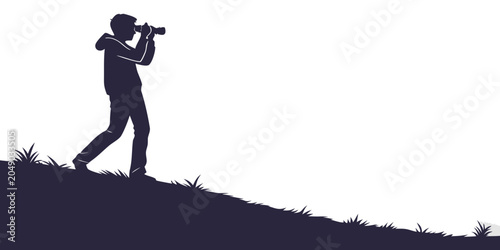 Obraz na plátně Silhouette of a person looking through binoculars standing on a grassy hill with