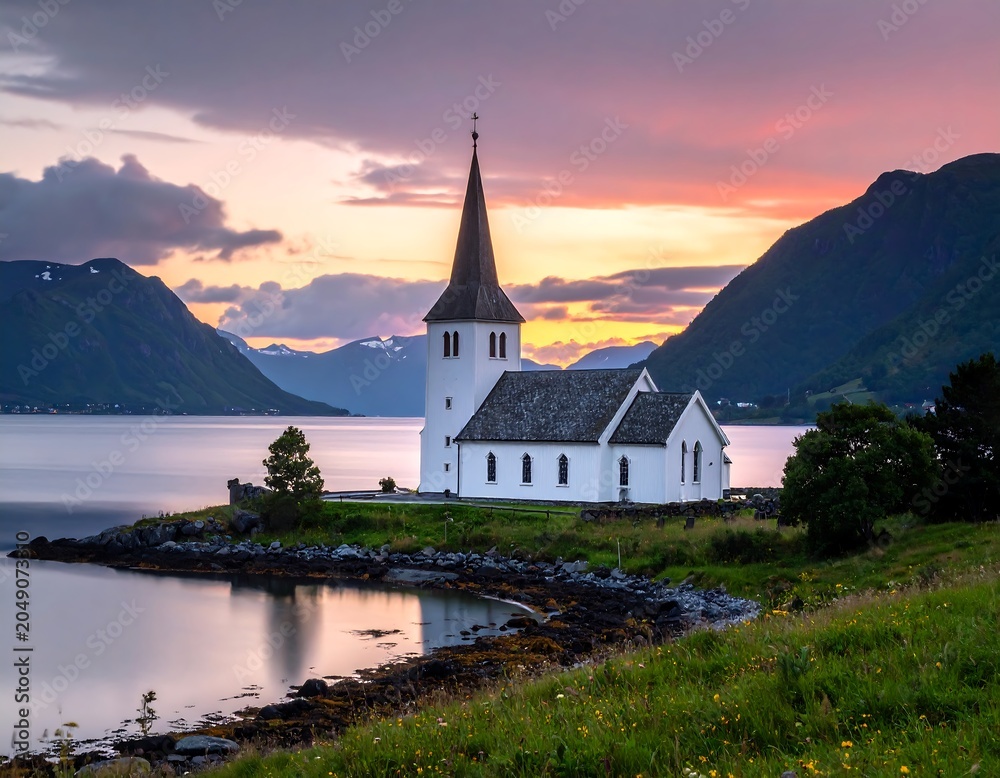 Fototapeta premium Serene church, scenic fjord, mountains, sunset, long exposure