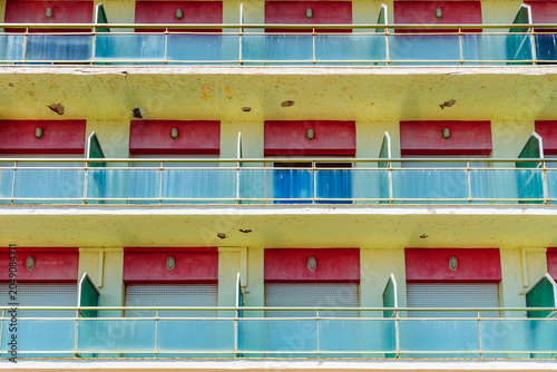 Typical holiday resort apartments and hotel facade in Spain during summer