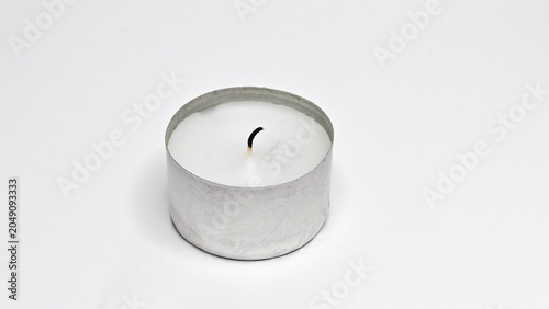 Canvastavla White candle on white background used