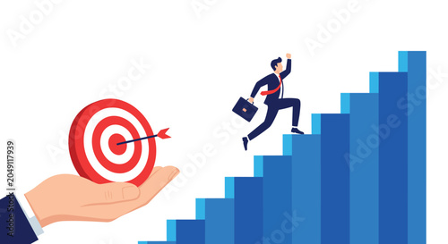Motivated businessman in a suit running up a blue bar chart staircase towards a target bullseye held by a supportive hand.