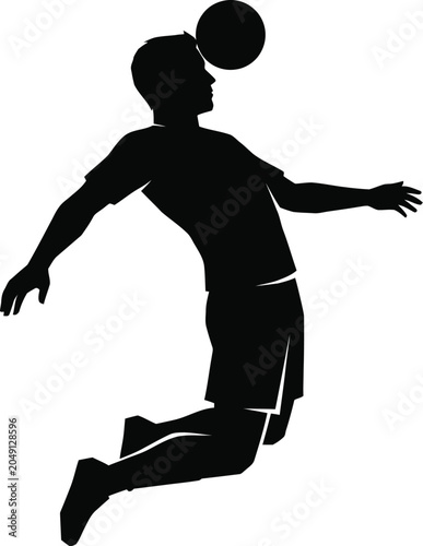 Silhouette of a soccer player heading a ball during a jump