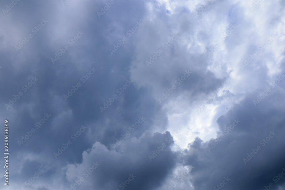 Fototapeta premium Dark heavy clouds before a thunderstorm. Natural sky background. Copy space