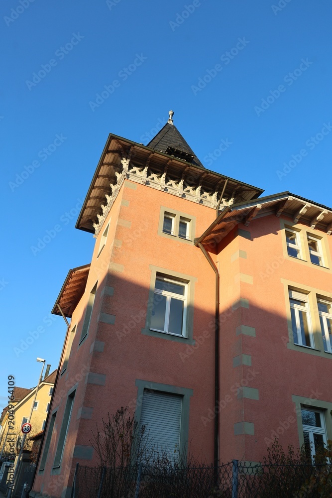 Fototapeta premium Historical Building with Tower Against Blue Sky