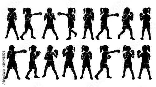 Silhouette of a girl boxes throwing punches.