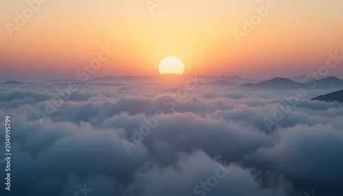 Sunrise above the clouds landscape view.