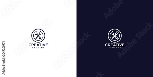 Fotografija Creative logo of crossed wrench and screwdriver in a circle, ideal for businesse