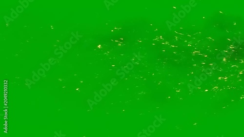 Explosion effect with fire and sparks on a green screen background.