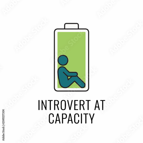 Minimalist graphic illustration of a person sitting inside a full battery icon with the text Introvert at Capacity on a white background