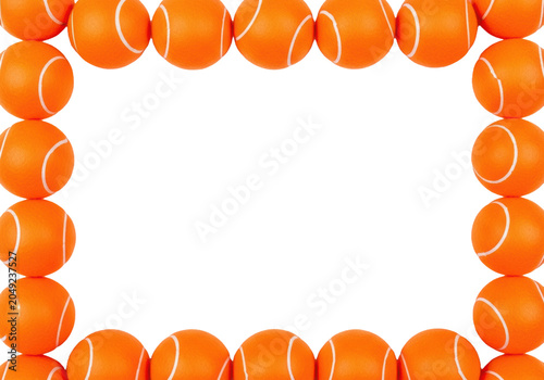 overhead flat lay of vibrant fluorescent neon orange tennis balls forming a precise rectangular border on a transparent background, macro detail and ample copy space. concept for sports advertising