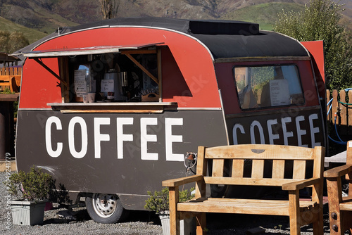 Vintage coffee caravan serving refreshments in a rural New Zealand setting.