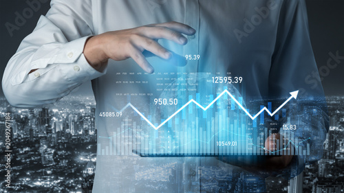 Φωτογραφία A business professional interacts with a tablet displaying data analysis