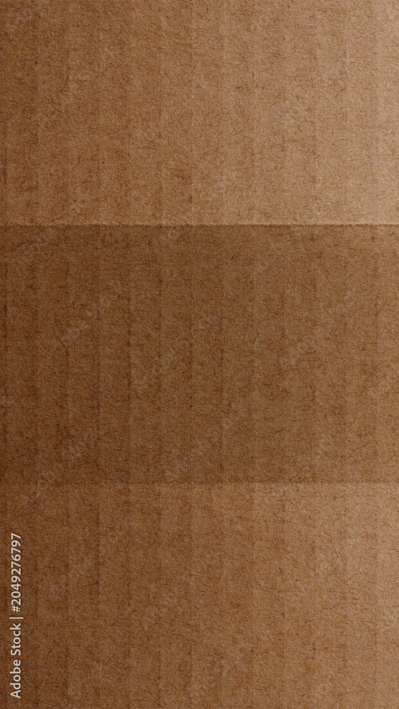 Fototapeta premium Textured brown cardboard background mobile wallpaper
