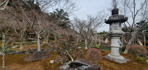 Fotografie Traditional Japanese Landscape with Temple, Castle and Flowers