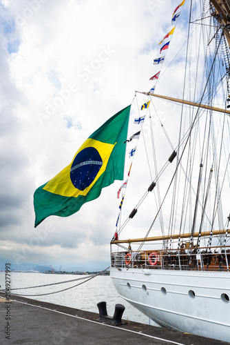 Brazilian Flag Flying on Historic Tall Ship at Harbor