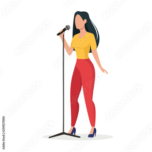 Woman singing into a microphone on a stand