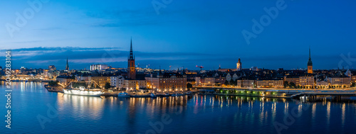 Stockholm Skyline Reflections Across Blue Hour Waterfront
