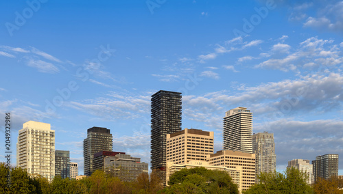 Canvas Print A wide panoramic skyline view of high rise apartment buildings and residential c