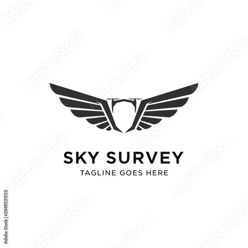 Tableau sur toile Professional logo featuring symmetrical black wings framing a central shield, ideal for security firms, aviation companies, or defense agencies