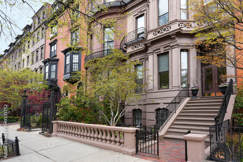 Konstfotografi Old brownstone style apartment buildings with bay windows