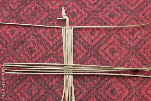 The process of making suket puppets, which are made from a type of grass called mendong