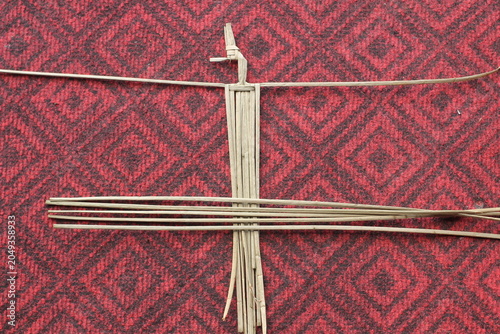 The process of making suket puppets, which are made from a type of grass called mendong