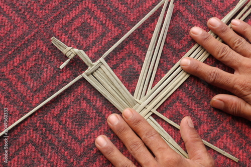 The process of making suket puppets, which are made from a type of grass called mendong