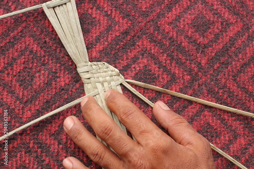 The process of making suket puppets, which are made from a type of grass called mendong