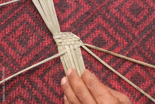 The process of making suket puppets, which are made from a type of grass called mendong