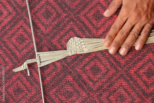The process of making suket puppets, which are made from a type of grass called mendong
