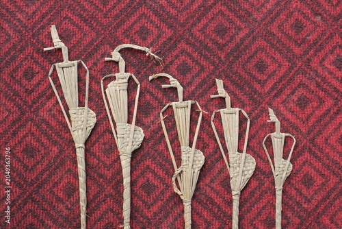 The process of making suket puppets, which are made from a type of grass called mendong