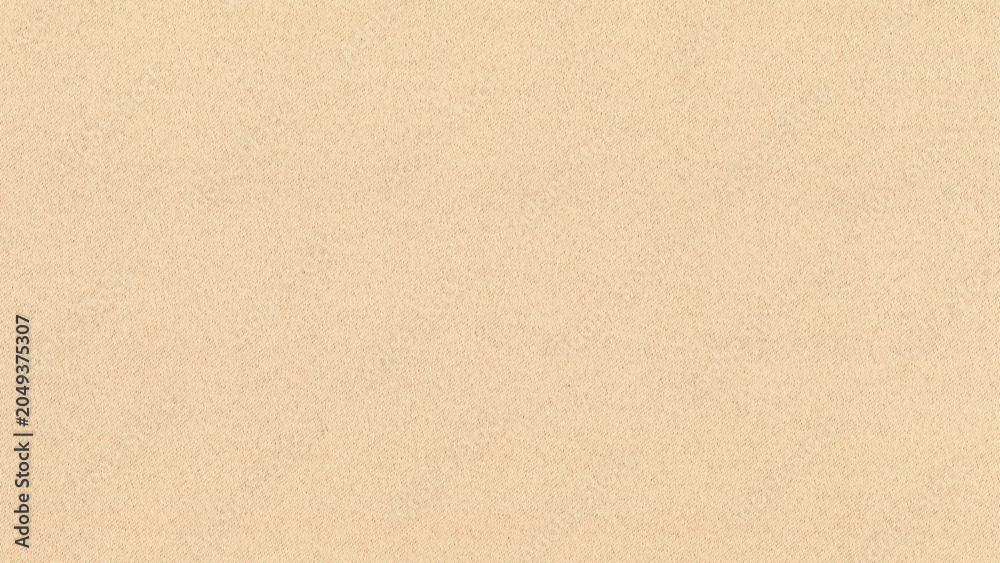Fototapeta premium Beige textured desktop wallpaper with a subtle, soft fabric-like appearance
