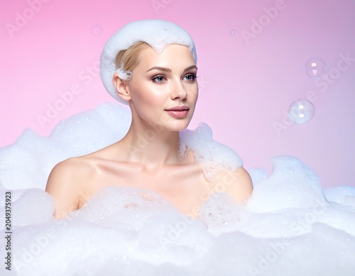 A woman in a bubble bath with a foamy head and body