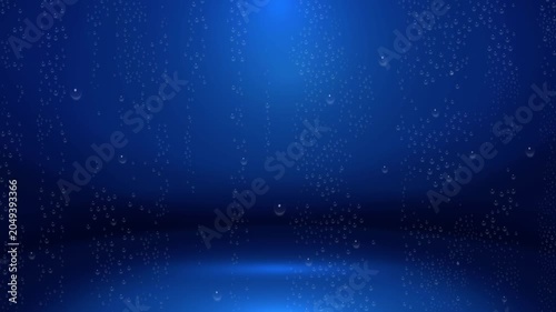 Water droplets falling on a dark blue background