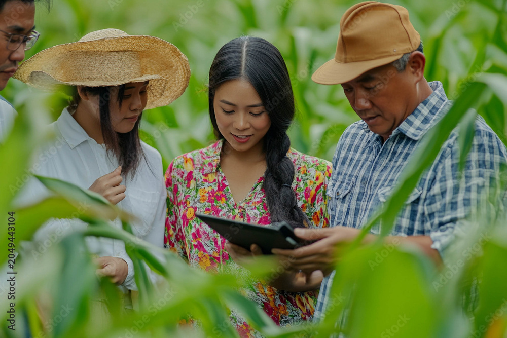 Fototapeta premium A diverse group of farmers inspecting smart farming technology in a field during autumn. Generated image