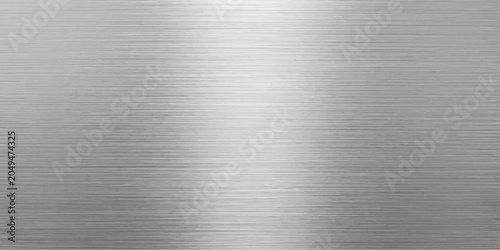 Foto Brushed silver metallic background with single directional lower-right spotlight