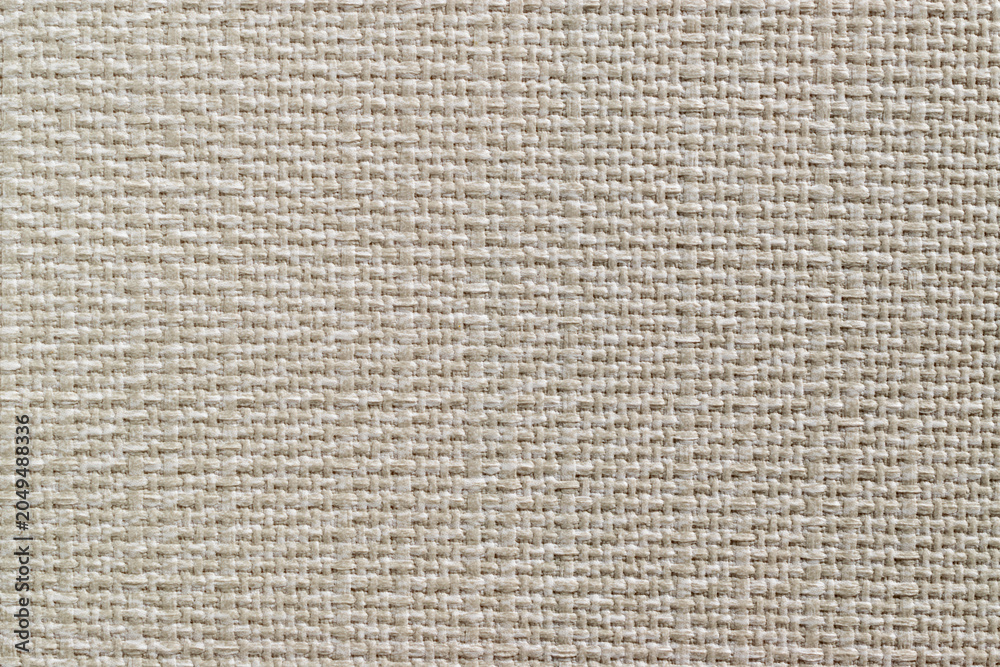 Fototapeta premium Close up of beige synthetic leather texture with woven pattern background. Premium faux leather upholstery material for furniture or fashion design.