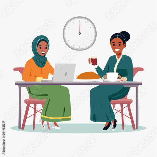 Two women of color, one wearing a hijab, working and having coffee