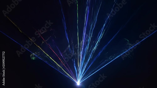 Vibrant laser beams in the dark.