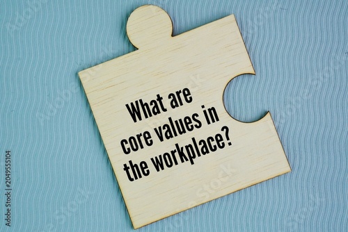 Bilde på lerret Wooden puzzle with question words What are core values ​​in the workplace? the f