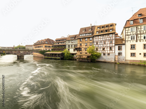 River wake and historic architecture along waterways of Strasbourg France