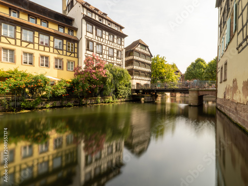 Scenic canal surrounded by historic buildings in Strasbourg old town