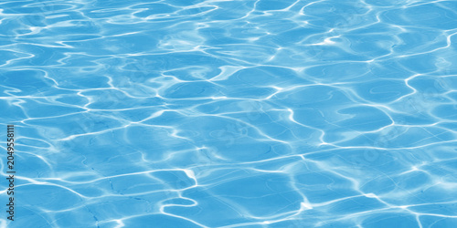 The ripples of small waves of blue and white water are dynamic yet still appear smooth, creating naturally repeating abstract patterns.