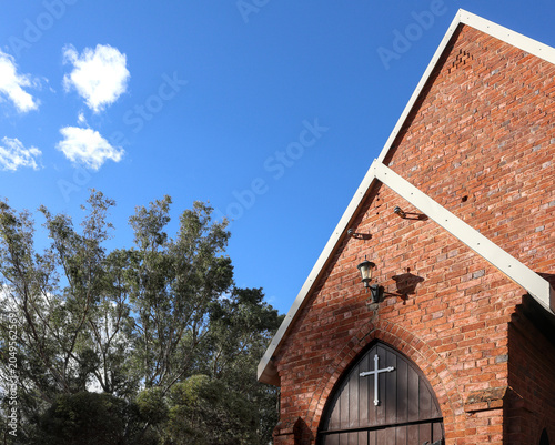 Bild auf Leinwand Historic red brick church
