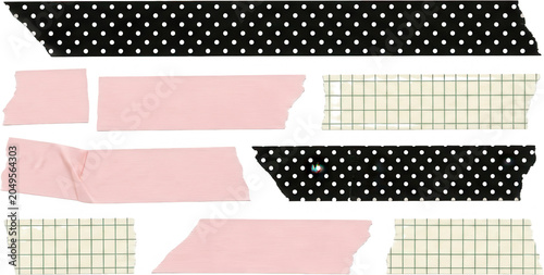 A collection of torn and ripped pieces of decorative masking tape with polka dot grid and solid pink patterns arranged across the frame decorative tape washi tape black adhesive