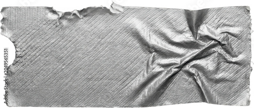 Torn silver duct tape with fabric texture and creased surface showing diagonal ribbed pattern and uneven edges silver tape torn tape adhesive tape gaffer tape repair tape
