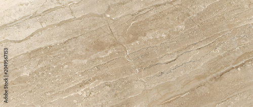 Marble background displays a gorgeous beige stone surface with elegant natural organic crystalline cracks
